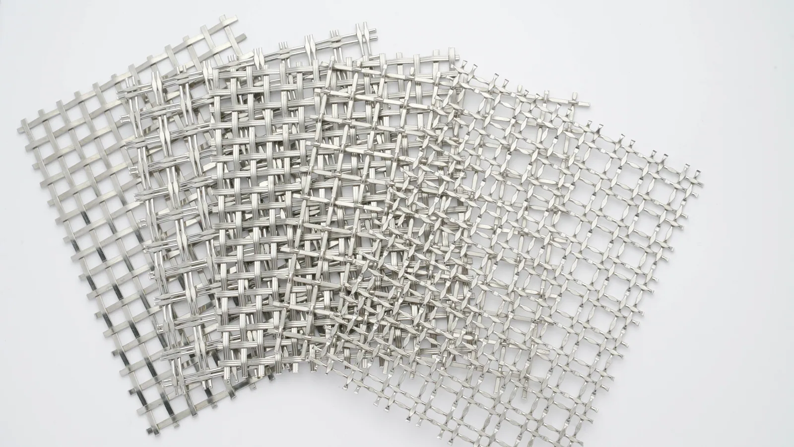 Architectural metal mesh samples with different open area and wire patterns
