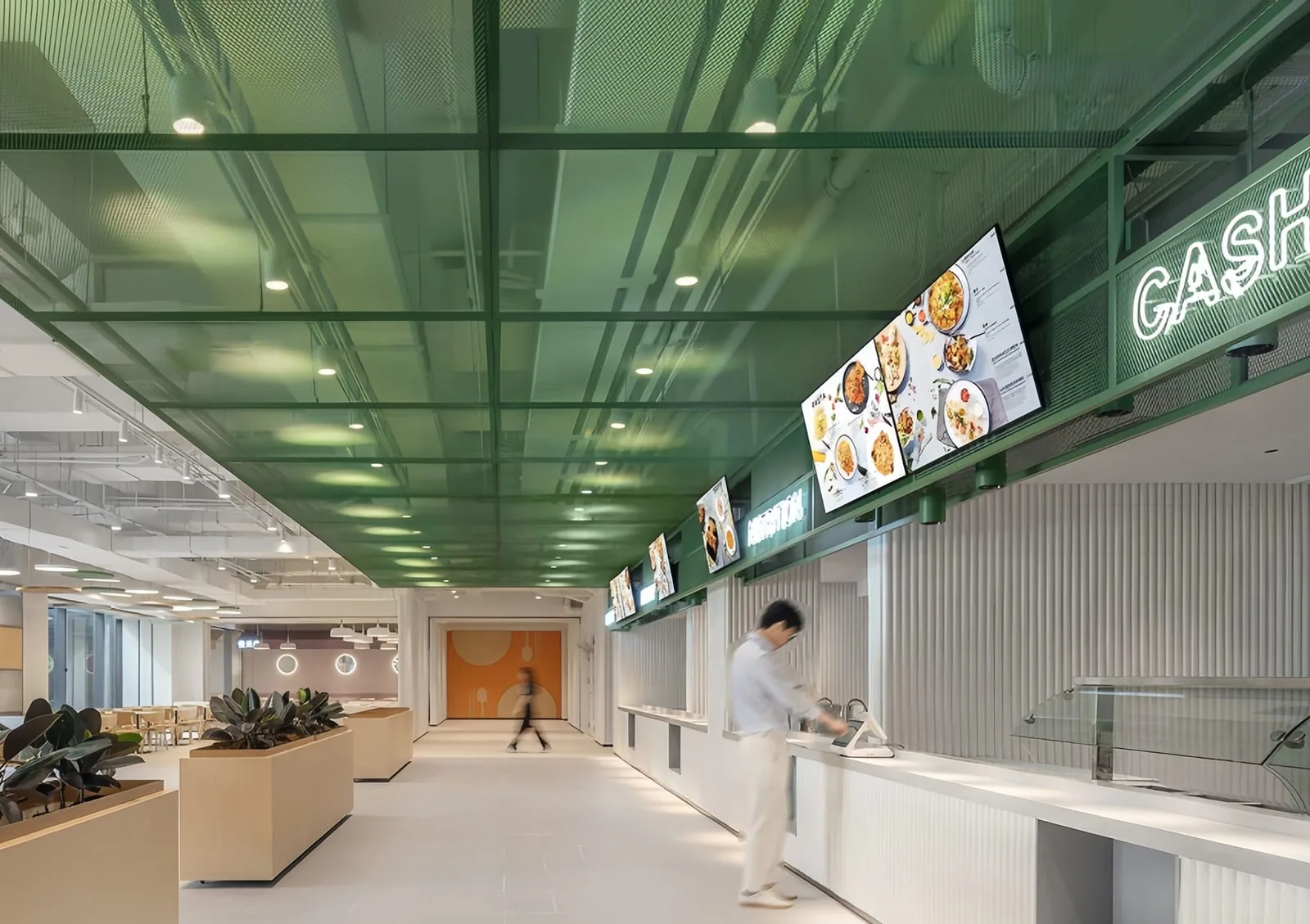 Green ceiling metal mesh surface in a commercial interior