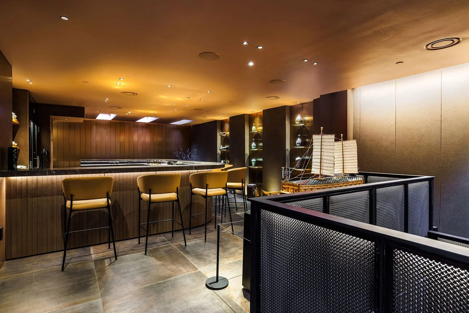 Woven wire mesh used as a hospitality bar partition